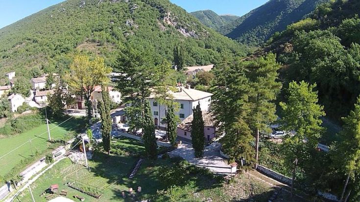 A cozy agriturismo surrounded by nature, featuring an authentic atmosphere.