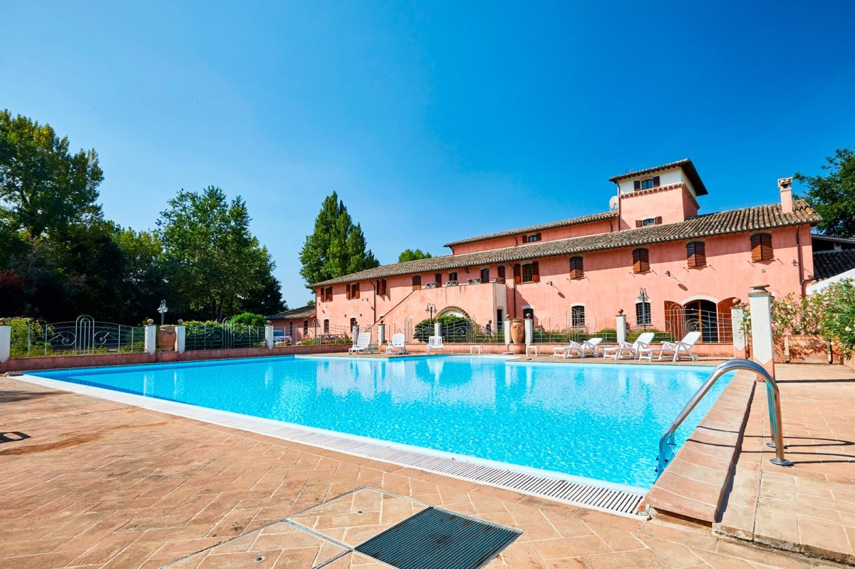 Recently renovated agriturismo with a pool amidst extensive green spaces, perfect for families and couples.