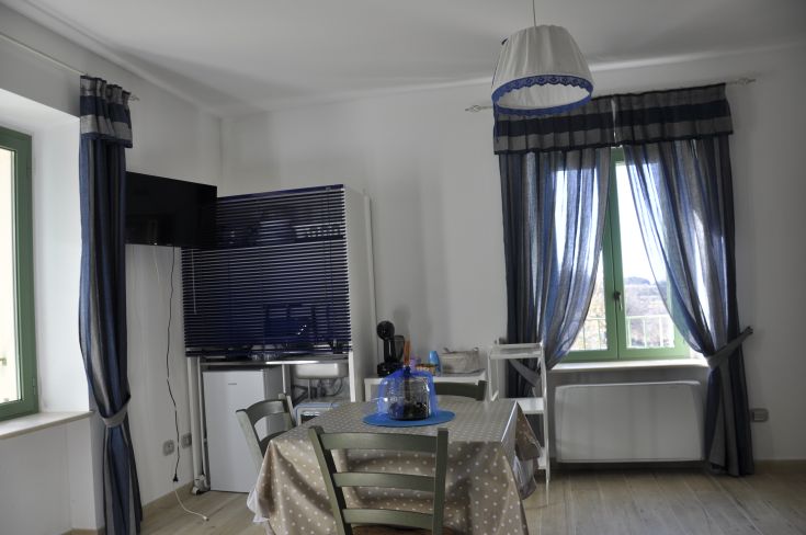 Renovated interior of a building set in the countryside, perfect for families and groups seeking relaxation.