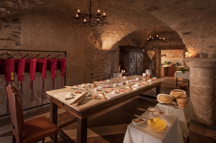 Inside a modern, functional kitchen with fresh ingredients and cooking tools.