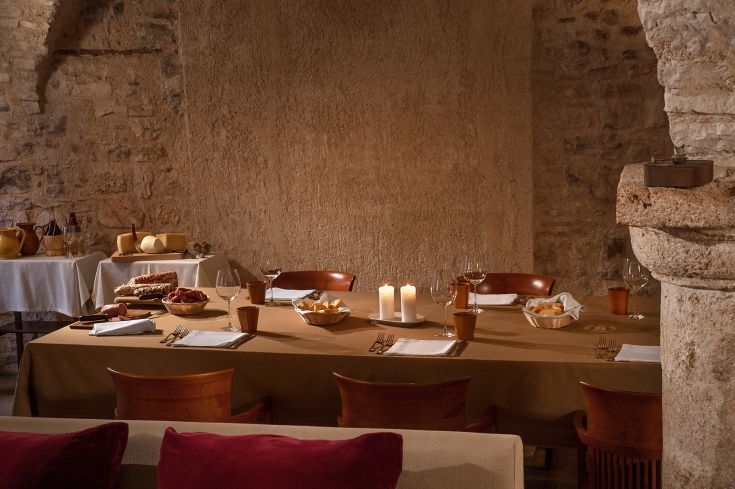 A cozy villa with a well-set dining table, ideal for an intimate dining experience.