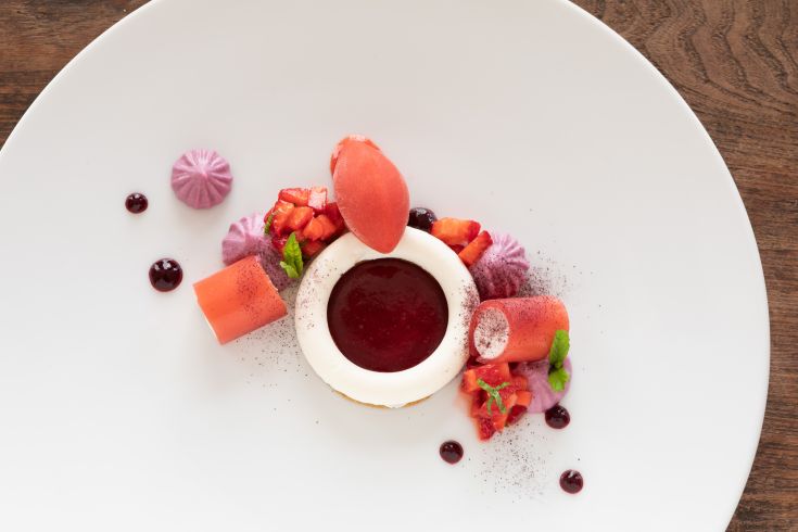 A refined dessert made with fresh ingredients and presented in a creative way.