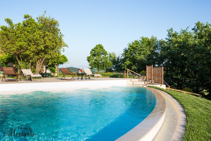 A pool located in a natural setting, perfect for moments of leisure and tranquility.