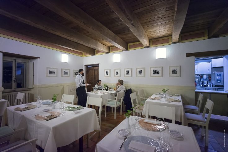 A restaurant with well-arranged tables and a cozy atmosphere.