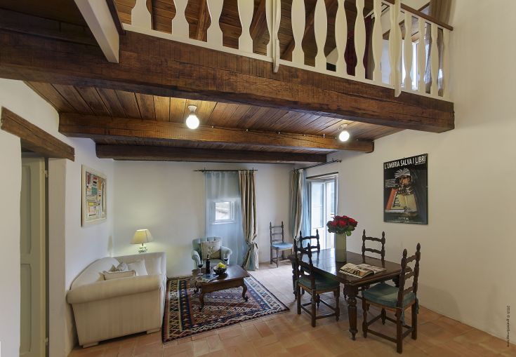 Cozy retro living room with simple, warm furnishings for a serene and comfortable relaxing atmosphere.