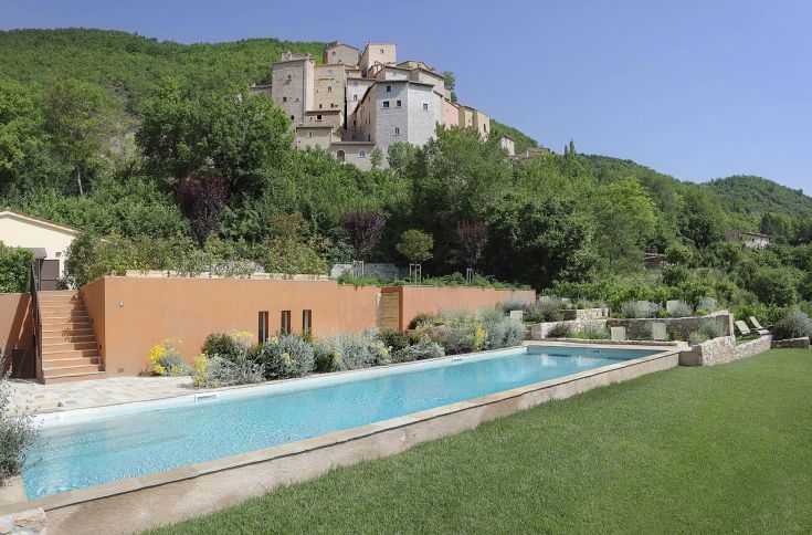 An ancient medieval village located in Valnerina, surrounded by nature and featuring a swimming pool.