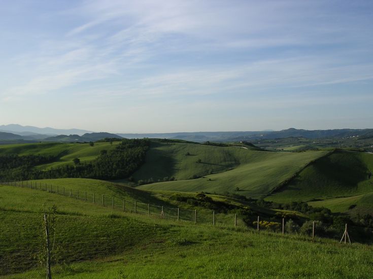 A serene view of green hills, perfect for enjoying the surrounding natural landscape.