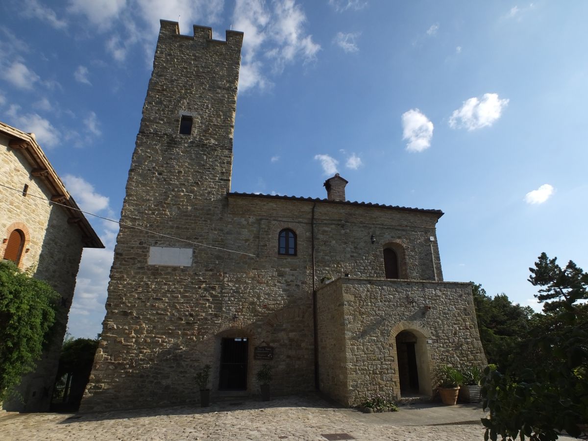 Medieval fortress surrounded by natural scenery, perfect for walks and outdoor relaxation.