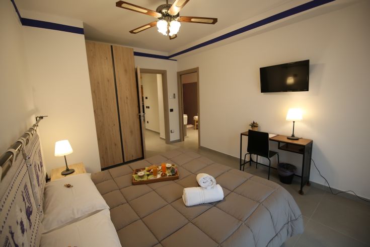 Cozy room of the B&B, featuring simple furnishings and a calm atmosphere for guests to relax.
