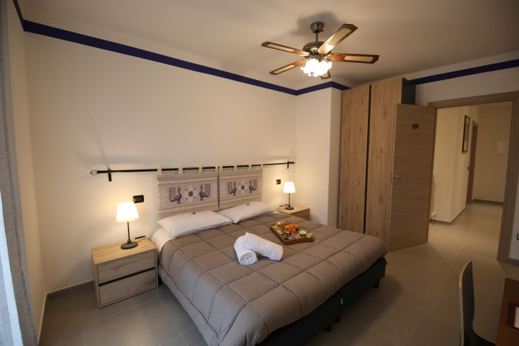 Cozy B&B room with well-maintained details, perfect for a peaceful stay.