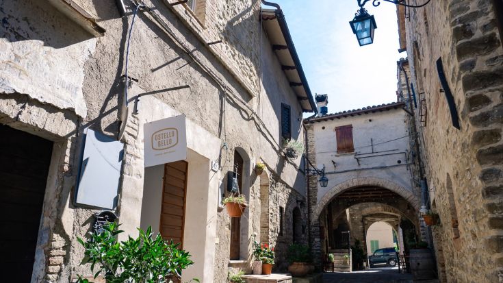 Detail of an ancient Umbrian village featuring stone buildings and a rustic atmosphere.