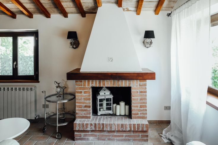 A brick pathway in a suite in Umbria, a cozy spot dedicated to relaxation.