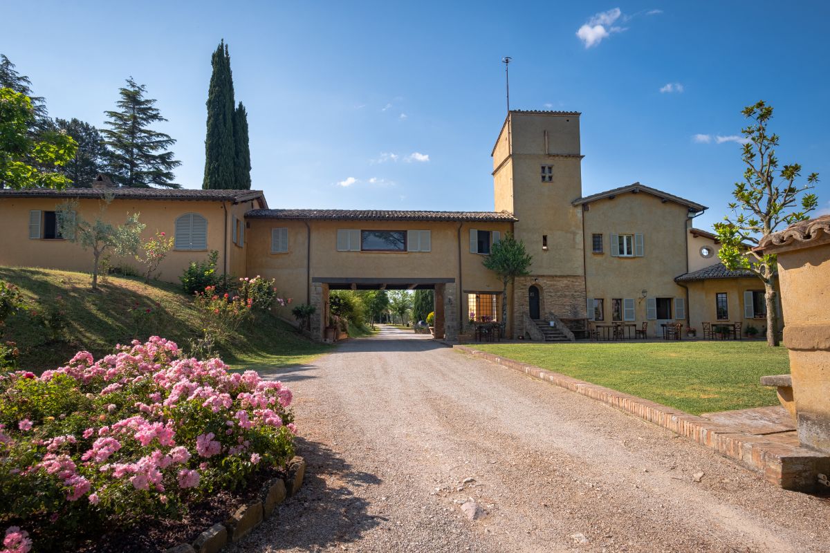 An ancient country house from 1660, set in the greenery of Umbria, featuring a swimming pool and beautiful views.
