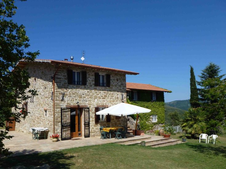A stone farmhouse nestled in nature, perfect for moments of relaxation and tranquility.