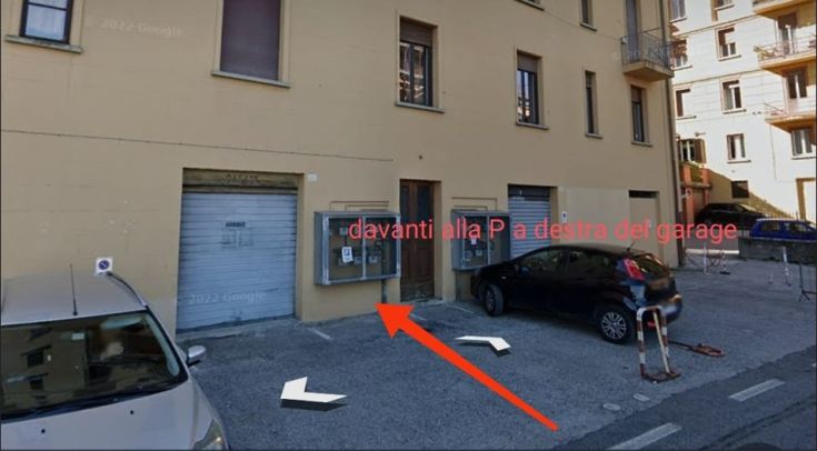 A peaceful area in a residential zone with clear signage for the garage.