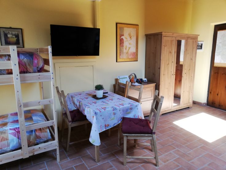 The interior of a palace featuring wooden furnishings, creating a tranquil space perfect for relaxation.