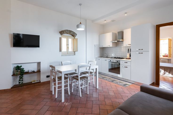 Gemütliches Apartment mit Küche und Essbereich, perfekt für einen Urlaub in Umbrien.