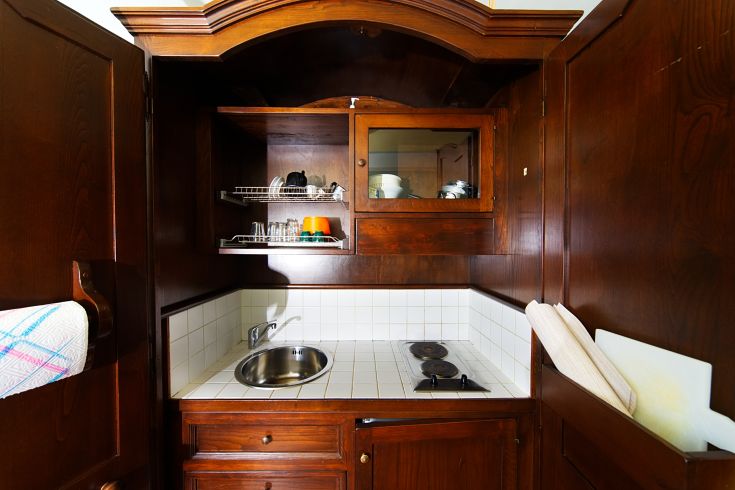 Simple and equipped kitchen within Luncinaia Residences, ideal for short stays in Perugia.