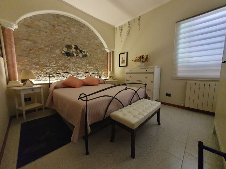 A quiet bedroom with simple furnishings, comfortable beds, and a relaxing atmosphere.