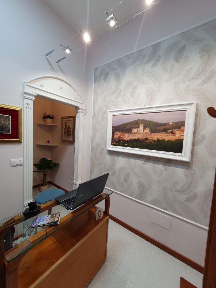 A cozy interior with subtle decorations and a displayed decorative element on the wall.