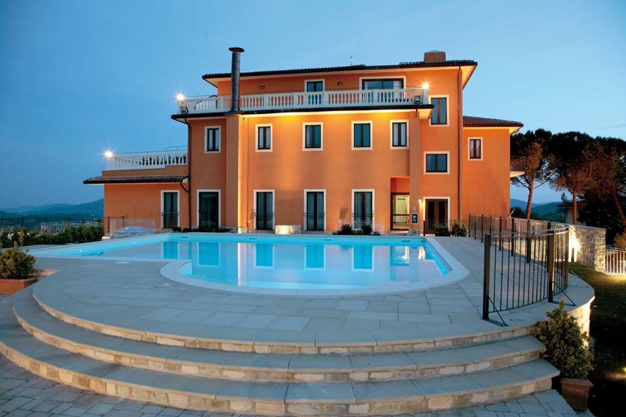 Hotel Fortebraccio features a pool and outdoor spaces for a comfortable stay.