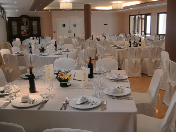 A cozy dining room set with a table and chairs, perfect for gatherings.