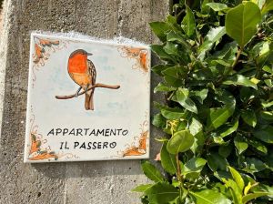 Informative sign displaying the name of the apartment 