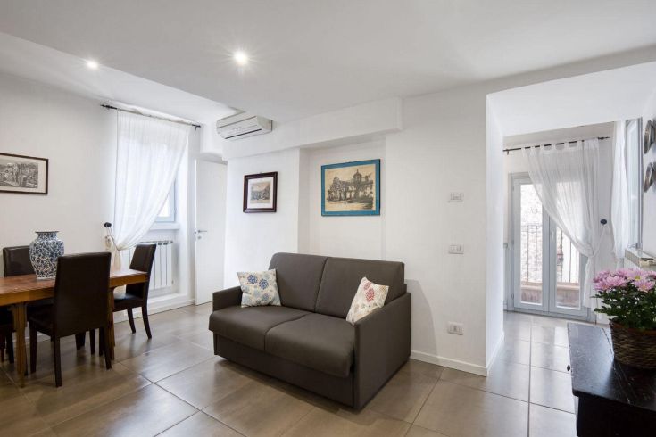 Cozy and modern apartment featuring a bright living room and a functional dining area. Perfect for stays in Narni.