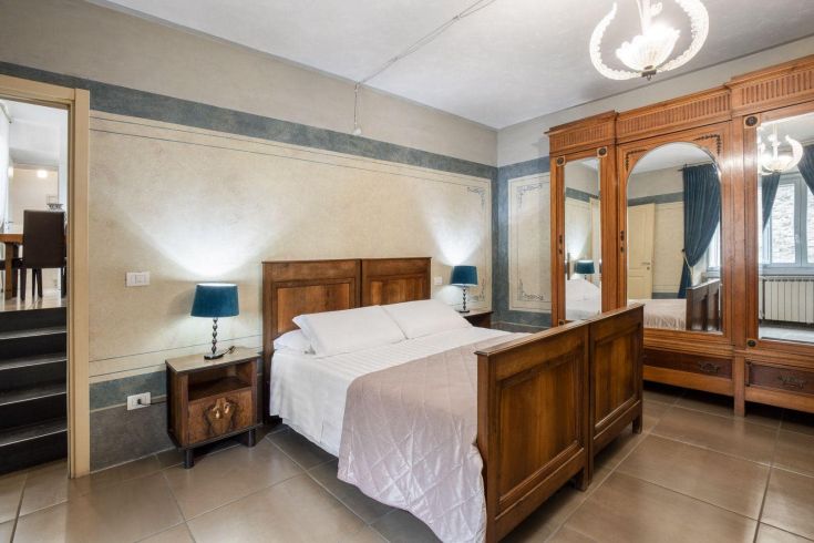 Cozy room in an ancient palace with vintage furnishings and modern comforts.