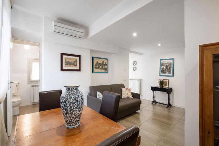 Modern and bright interior with essential furnishings, perfect for a relaxing living space.