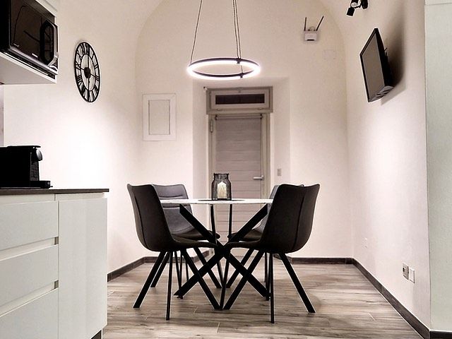 A cozy kitchen corner with a simple table and contemporary decor.