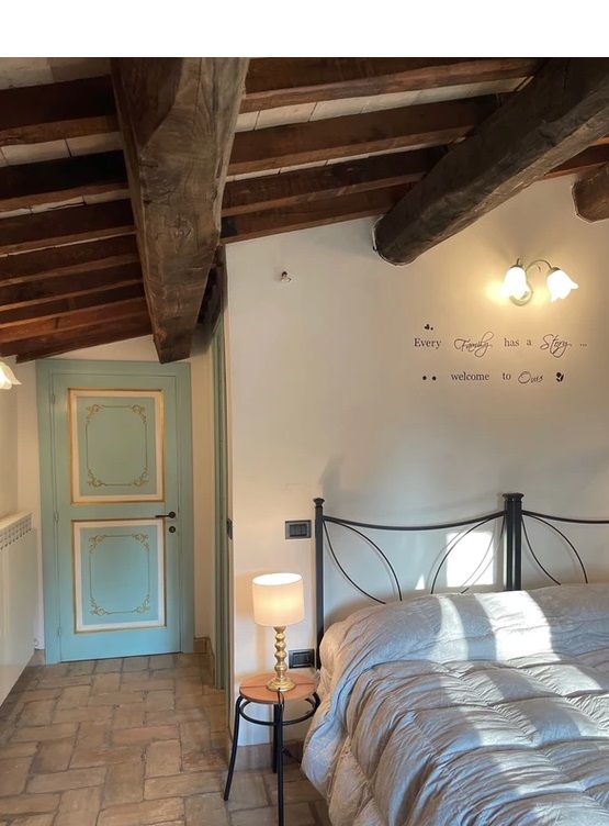 A simple room with rustic elements and understated decor, perfect for relaxing moments.