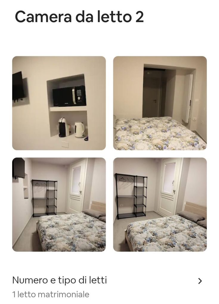 Camera da letto matrimoniale ben illuminata, dotata di mobili recenti e comfort essenziali per un soggiorno gradevole.