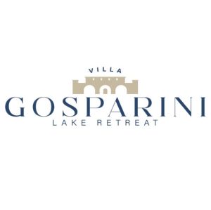 A cozy living room in Villa Gosparini, surrounded by nature with a view of Lake Trasimeno.