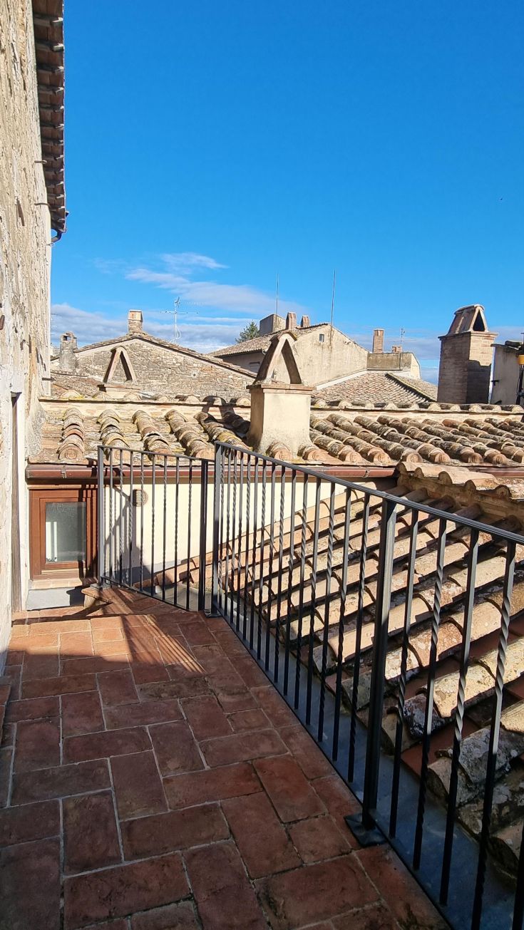 Small terrace overlooking the historic buildings, perfect for enjoying a panorama of Amelia.