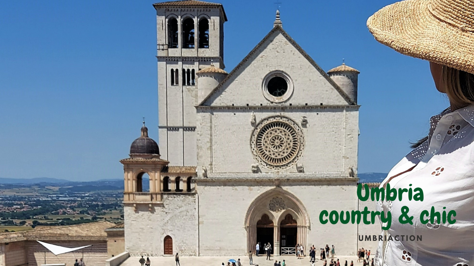 Esplora la basilica e i paesaggi tipici dell'Umbria, caratterizzati da colline verdi e borghi storici.