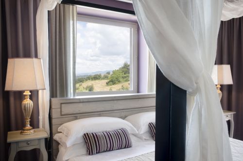 Una camera semplice e accogliente, adatta per momenti di relax e benessere.