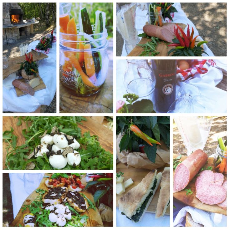 Un semplice banchetto all'aperto con specialità regionali e ingredienti freschi, ideale per trascorrere una giornata tranquilla.