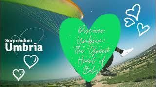 Scopri l'Umbria, una regione italiana caratterizzata da verdi colline, praticando parapendio sopra scenari naturali.