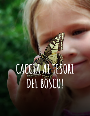 bambina tocca una farfalla gialla e nera 